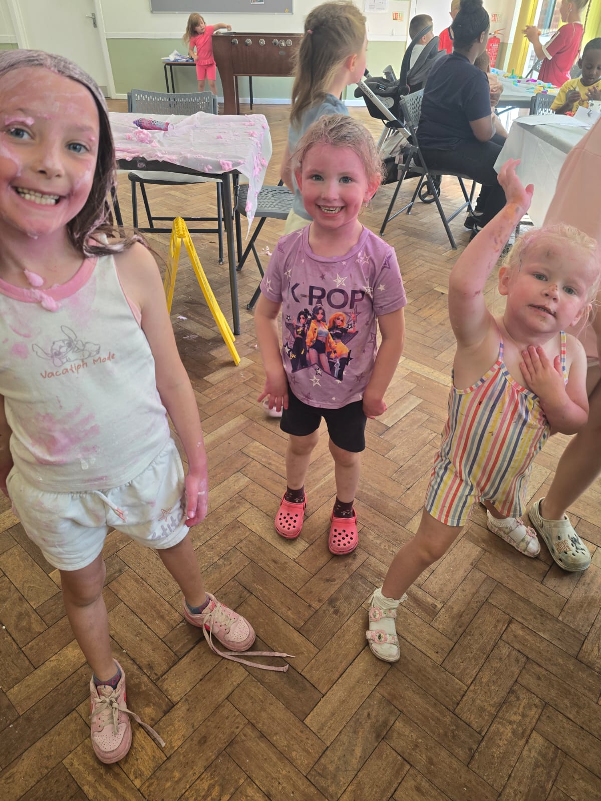 Children enjoying messy play at Greaves Square