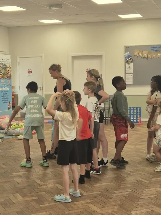 Children taking part in a group activity at Greaves Square