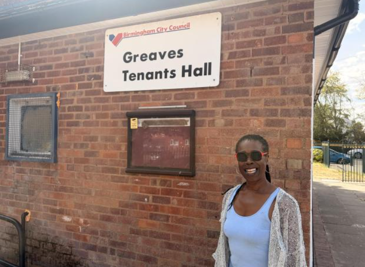 Team member outside Greaves Tenants Hall